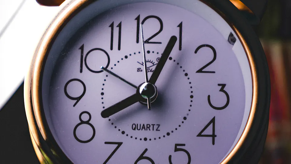 A silver twin-bell alarm clock