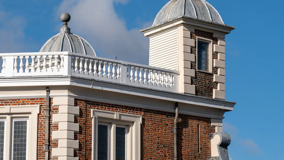 Domes on the roof of the Royal Observatory building in Greenwich, London