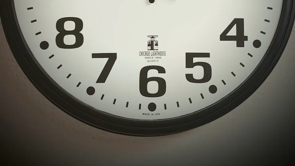 Close-up of an analog wall clock face