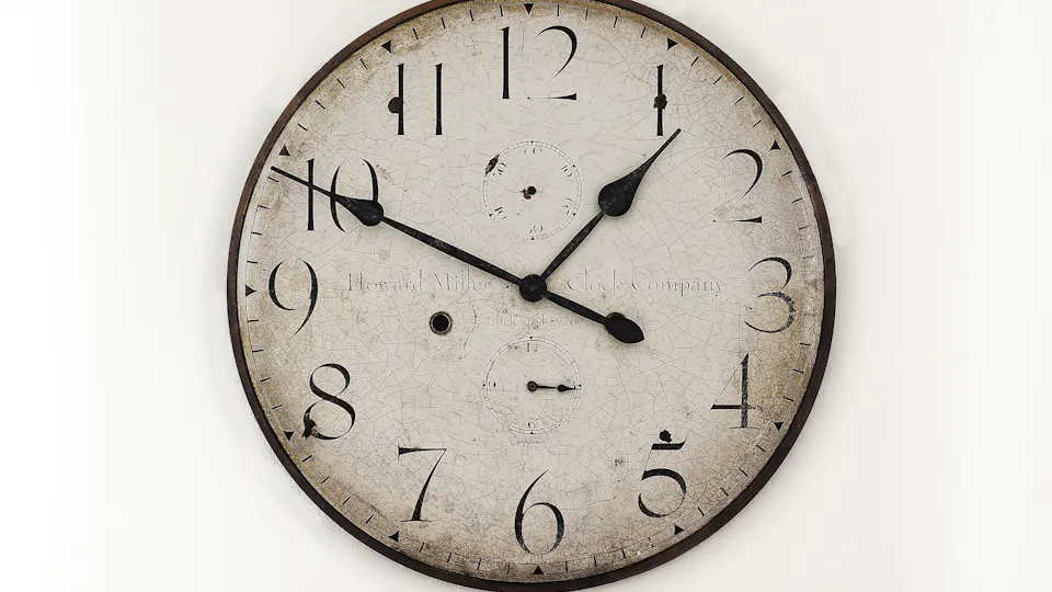 A group of analog clocks mounted on a wall